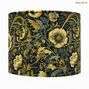 May include: A cylindrical lampshade featuring a dark black background with an intricate botanical pattern of large yellow and gold flowers, swirling green leaves, and curling vines that cover the entire surface of the fabric material.