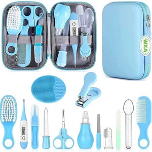 May include: A baby care kit in a light blue zippered case. The kit includes a brush, comb, scissors, nail clippers, a thermometer, and other grooming essentials. The case is light blue with a white tag.