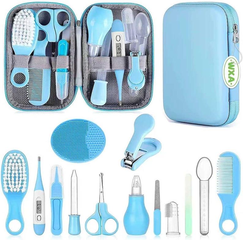May include: A light blue baby care kit with a zippered case. The kit includes a brush, comb, scissors, nail clippers, a thermometer, and other grooming tools. The case is light blue with a white tag.