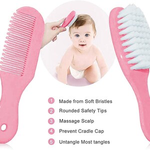 May include: Pink baby hairbrush and comb set. The comb has widely spaced teeth, and the brush features soft white bristles. The set is designed for gentle hair care. The image also shows a baby.