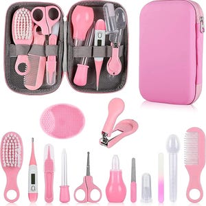 May include: A pink baby grooming kit with a variety of tools, including a brush, comb, scissors, nail clippers, and a thermometer. The kit is in a zippered case and includes a pink silicone face scrubber.