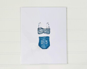 May include: A watercolor illustration of a blue and white striped swimsuit with a high-waisted bottom.