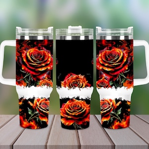 May include: Three stainless steel tumblers with a white handle. Each tumbler features a black background with a floral design of red and orange roses.
