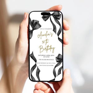 May include: A black and white birthday invitation with gold text. The invitation features a black ribbon bow and the text "Join us to celebrate Amelia's 30th Birthday". The invitation also includes the date, time, and location of the party.