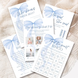 Peut inclure: Ensemble de cartes de jeux pour une fête prénuptiale avec un motif de nœud bleu à l'aquarelle. Les jeux incluent "Qui connaît le mieux la mariée ?", "Quel âge avait la mariée ?", "Il a dit, Elle a dit" et "Trouvez l'invité Bingo".