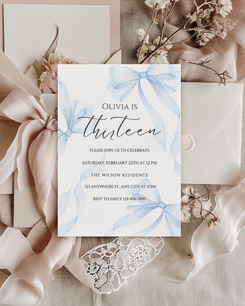 May include: A blue and white birthday invitation with a watercolor design of blue ribbons and bows. The text reads "Olivia is Thirteen" and includes details for the party, including the date, time, location, and RSVP information.