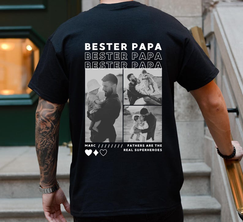 May include: Black t-shirt with the text "Bester Papa" repeated three times. The shirt features a collage of three black and white photos of a father with his children. The text "Fathers are the real superheroes" is below the photos.