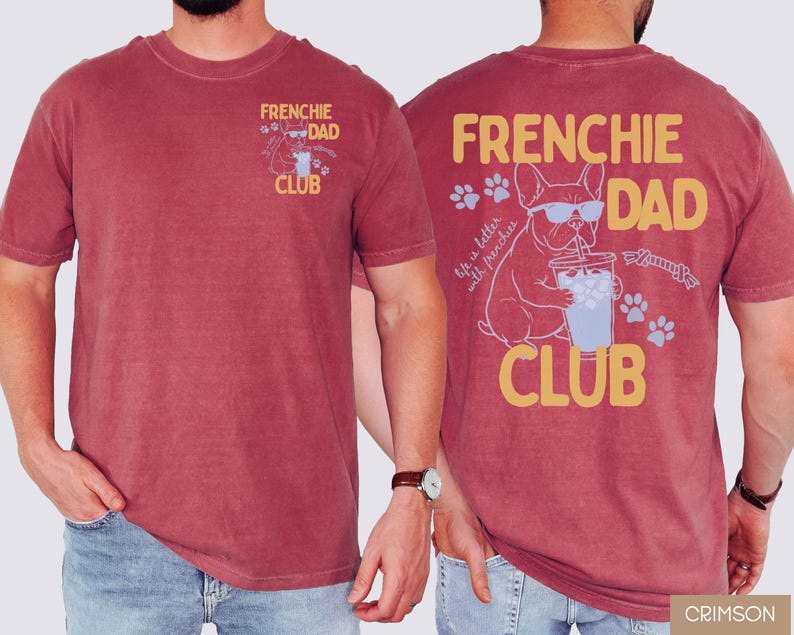May include: Crimson t-shirt with "FRENCHIE DAD CLUB" text and a French Bulldog graphic. The front features a small design, while the back showcases a larger illustration of the dog with sunglasses, a drink, and paw prints.