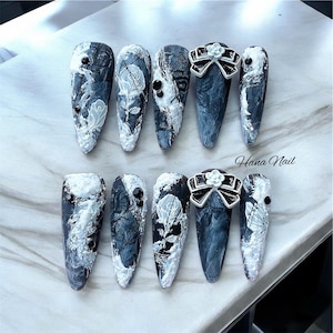Edgy Black and White Marble Rose Nail Art with 3D Gel Design, Black Rhinestone Bow, Matte Finish, Gothic Chic Manicure, Bold Floral Nails