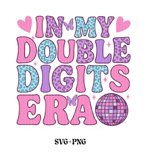 May include: A vibrant graphic featuring the phrase "IN MY DOUBLE DIGITS ERA" in pink, blue, and purple hues. The design incorporates hearts, butterflies, a disco ball, and the text "SVG+PNG".