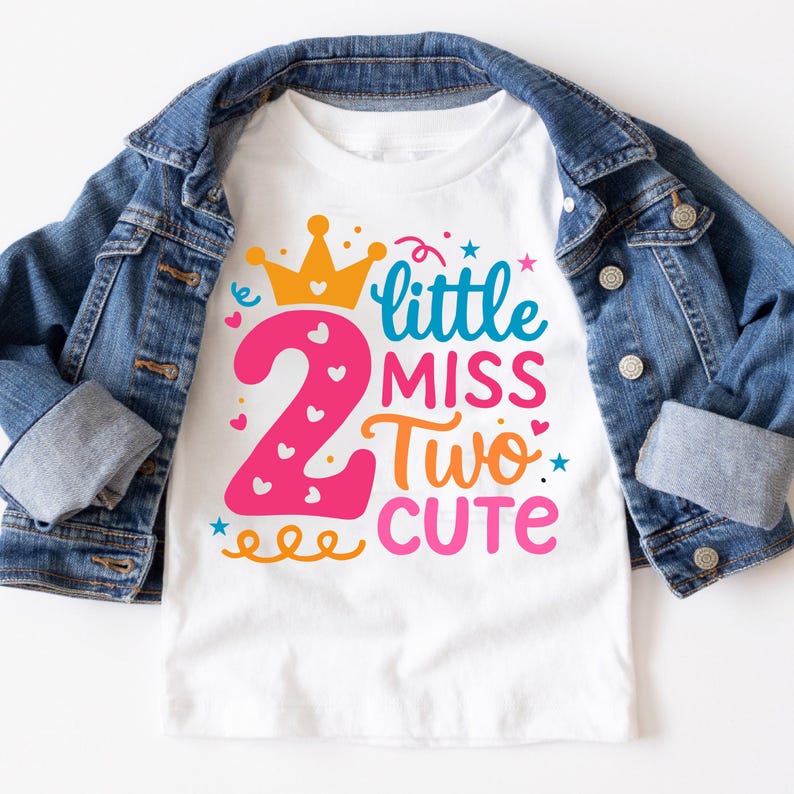 May include: White t-shirt with a pink number 2, a gold crown, and the text "little miss two cute" in colorful letters.