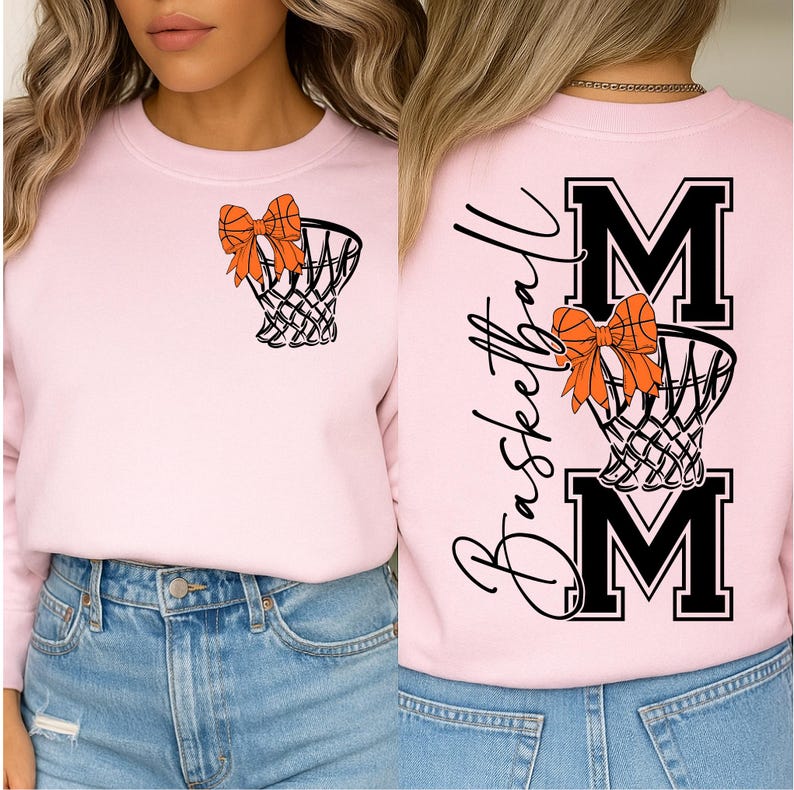 Puede incluir: Sudadera rosa claro con un dise&ntilde;o de red de baloncesto y lazo. La parte trasera presenta la palabra "Basketball" en cursiva, con "MOM" en letras negritas, y un dise&ntilde;o de red de baloncesto y lazo.