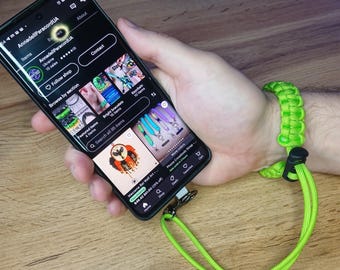 Paracord-telefoonpolskoord – verstelbare macraméarmband met roterende clip en patch, veilige mobiele telefoonhouder voor op reis en voor kinderen