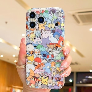 May include: A colorful phone case featuring a vibrant pattern of various cartoon characters. The case has a glossy finish and a multi-camera cutout. The design includes characters in shades of blue, yellow, green, and purple.