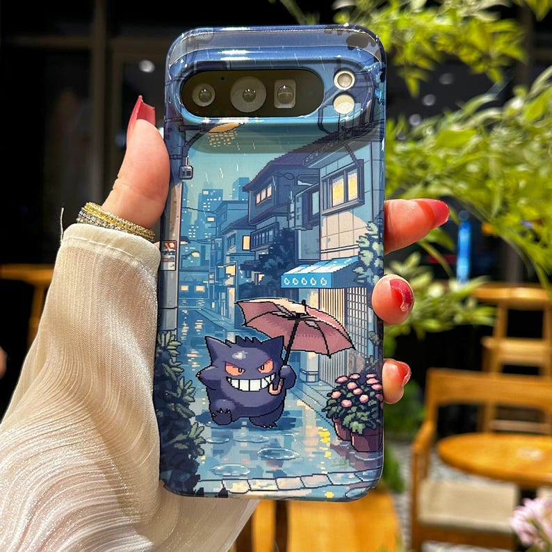 May include: A blue phone case featuring a pixelated illustration of a purple cartoon character holding an umbrella in a rainy street scene. The case has a glossy finish and a protective design.