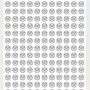 May include: A sheet of 100 black and white round stickers that say "Gluten Free" in a white circle with a black border.