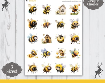 May include: A sticker sheet titled Long Lake Designs Cute Bumble Bee featuring twenty individual illustrations of cartoon bumble bees in various poses, some near wooden hives or flowers, printed on a white background with black text.