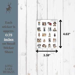May include: A rectangular sticker sheet titled Spooky Dolls by Long Lake Designs featuring various illustrated doll characters. The sheet measures 8.59 cm by 11.76 cm, with each individual sticker measuring approximately 1.91 cm in size.