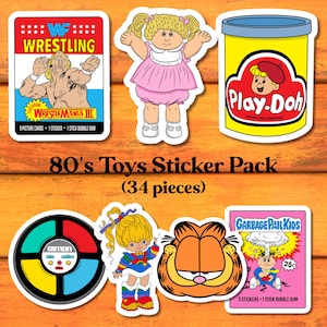 May include: A sticker pack featuring iconic 1980s toys. Includes stickers of a WWF wrestler, a Cabbage Patch Kid, a Play-Doh container, a Simon game, a Rainbow Brite-like character, Garfield, and a Garbage Pail Kid. The pack contains 34 pieces.
