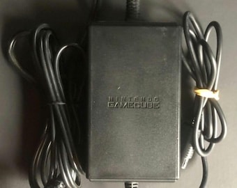 Nintendo GameCube power supply + cinch video cable