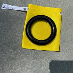 Angela Caputi black resin bangle bracelet