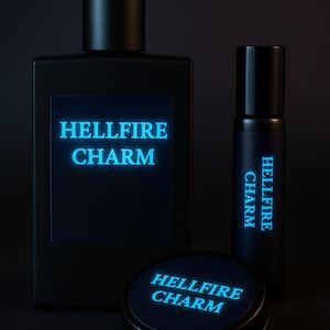 May include: A collection of three black cosmetic containers with the text "HELLFIRE CHARM" in glowing blue. The set includes a rectangular bottle, a roll-on bottle, and a small round tin, all against a dark background.