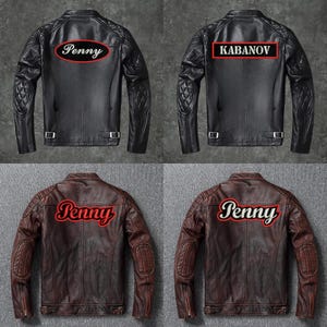 May include: Four black and brown leather jackets with different patches on the back. Two jackets have a red "Penny" patch, one has a red oval "Penny" patch, and one has a white "KABANOV" patch in a red rectangle.