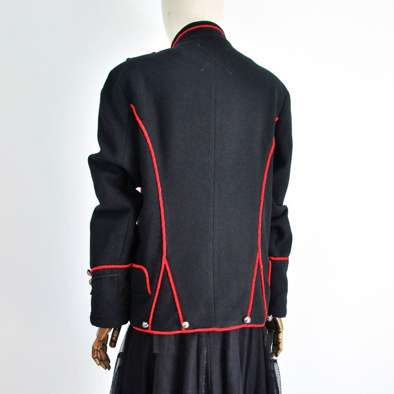 Frog closing Black color with red trim CASTELBAJAC men jacket Military style Wool and viscose. Epaulettes on the shoulders