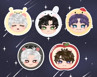 May include: A collection of five cartoon character stickers. Each sticker features a different character with unique hair and eye colors, framed by various shapes like a bear, bunny, and apple. The background is a dark blue with white stars and shooting stars.