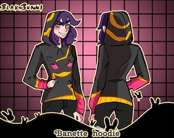 May include: Black hoodie with a yellow and black Banette design. The hoodie has pink accents on the sleeves and a black and yellow stripe around the bottom.