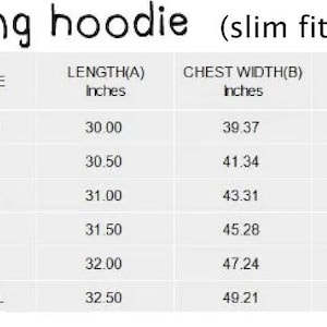 May include: A diagram of a long hoodie with size measurements in inches. The text reads "Ladies long hoodie (slim fit - tight arms)". Measurements include length, chest width, sleeve, and hips for sizes XS to 2XL.