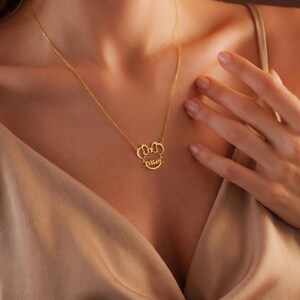 Sparkle with the magic of Disney! Our adorable dainty minnie necklace for kids is a dream come true for your little fan. This personalized cartoon necklace combines the timeless charm of Mickey or Minnie Mouse with your child's very own name, creating a one-of-a-kind keepsake they will treasure on their next Disneyland trip and beyond.