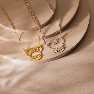 Sparkle with the magic of Disney! Our adorable dainty minnie necklace for kids is a dream come true for your little fan. This personalized cartoon necklace combines the timeless charm of Mickey or Minnie Mouse with your child's very own name, creating a one-of-a-kind keepsake they will treasure on their next Disneyland trip and beyond.