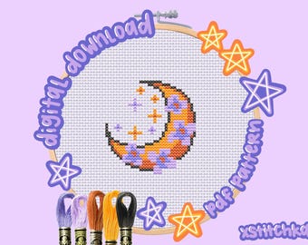 May include: Cross-stitch pattern featuring a crescent moon with stars and flowers in orange, purple, and white. The design is set in a wooden embroidery hoop, surrounded by star-shaped embellishments and embroidery floss. Text reads "digital download PDF pattern".