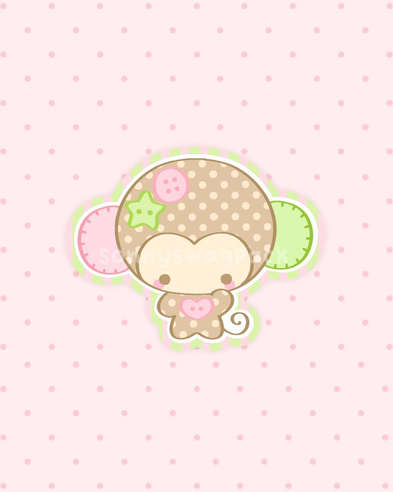 May include: A cartoon monkey illustration featuring a brown polka-dot pattern, a pink button on its head, a green star, and a pink heart on its chest. The monkey has two circular ears, one pink and one green, set against a light pink polka-dot background.
