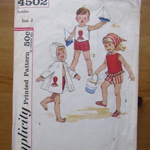 May include: Vintage Simplicity printed pattern for toddler size 2. The cover features illustrations of children in swimwear and a hooded coat, all adorned with octopus designs. The pattern number is 4502.