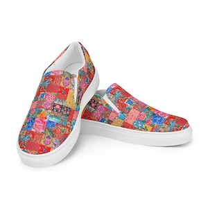May include: A pair of slip-on shoes with a patchwork design. The shoes feature a vibrant mix of floral patterns in red, blue, pink, and yellow. The soles are white.