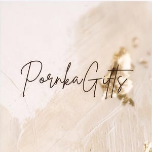 May include: A white background with a gold and white abstract design. The text "Porenka Gifts" is written in black cursive script.
