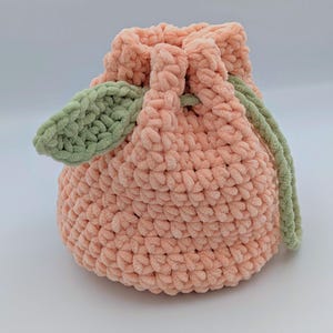 Soft Peach Drawstring Wrist Bag