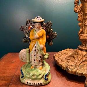 Circa 1840s Staffordshire Archar Woman Figurine – Hand Painted English Pottery