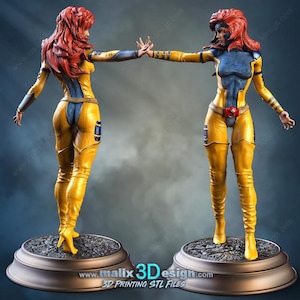 Peut inclure: Deux statues d'une super-héroïne en costume jaune et bleu avec des cheveux roux. Les statues sont sur un socle rond. Le costume comprend une ceinture à boucle rouge et des bottes hautes. Le texte "www.malix3Ddesign.com" est visible.