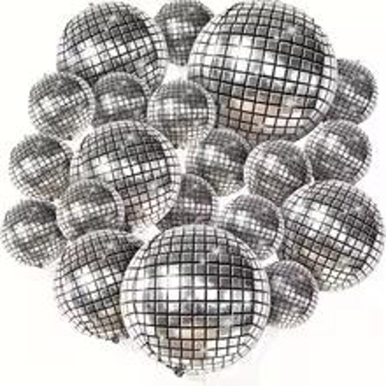 May include: A collection of silver disco balls of varying sizes, reflecting light. The spheres are covered in small, square mirrored tiles, creating a sparkling effect. The arrangement is clustered together against a white background.