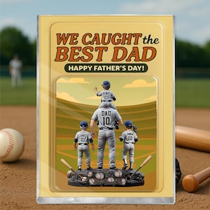 May include: A yellow card with the text "WE CAUGHT the BEST DAD HAPPY FATHER'S DAY!" and a picture of a baseball player with three children on a baseball field.