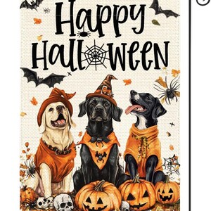 May include: Halloween garden flag featuring three dogs dressed in orange and brown Halloween costumes. The flag reads "Happy Halloween" with bats, spiders, and leaves. Pumpkins and skulls are at the bottom of the flag.