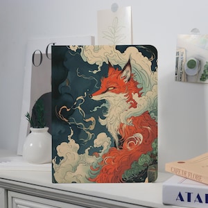 May include: A rectangular art print featuring a stylized red fox with white and orange fur, set against a dark teal background with swirling white clouds. The fox is the central focus of the artwork.