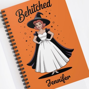 May include: Orange spiral-bound notebook featuring the text "Behitched" and a cartoon witch illustration. The witch is depicted in a black hat, cape, and white dress. The name "Jennifer" is printed at the bottom.