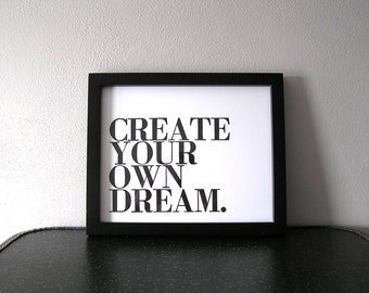 May include: Black and white framed print with the text "CREATE YOUR OWN DREAM."