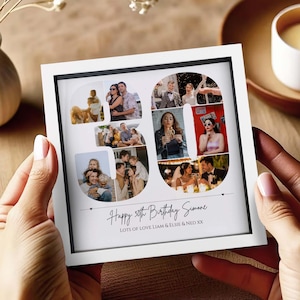 May include: A square white framed photo collage shaped like the number 30, featuring multiple candid photographs of people. Below the collage, the text reads: Happy 30th Birthday Simone, LOTS OF LOVE LIAM & ELSIE & NED XX. The frame is held in place.