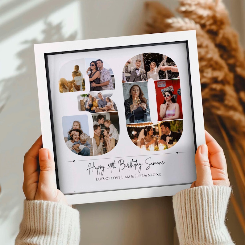 May include: A square white framed photo collage featuring the number 30 filled with various candid photographs of people. Below the number, the text reads: Happy 30th Birthday Simone, LOTS OF LOVE LIAM & ELSIE & NED XX. The frame has a black inner border.