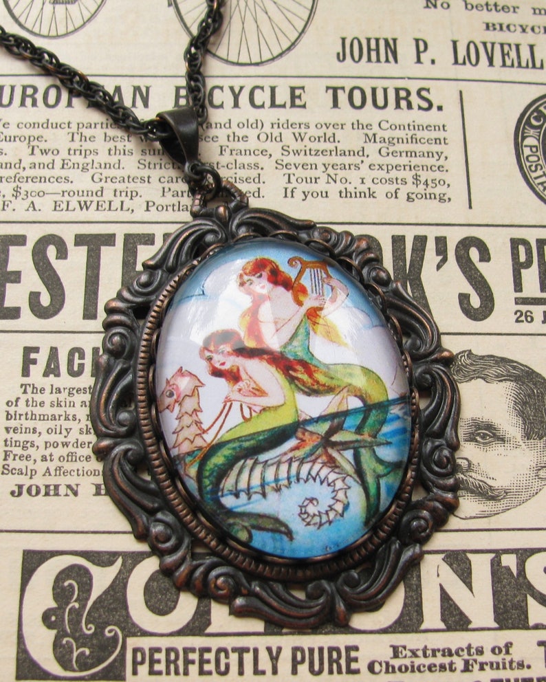 Mermaids on a Seahorse illustration, handmade glass oval cabochon 40x30 40x30mm, orange, yellow, aqua, vintage drawing image 2